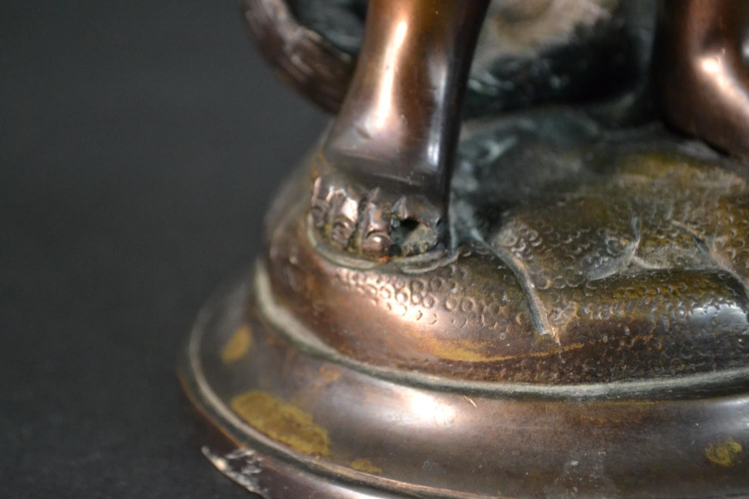 A spelter figure of a classical style putti with a basket of flowers. H.37cm - Image 8 of 8