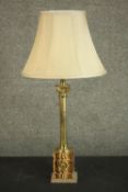 A 20th century Italian marble and brass Corinthian column table lamp, the marble base with a brass