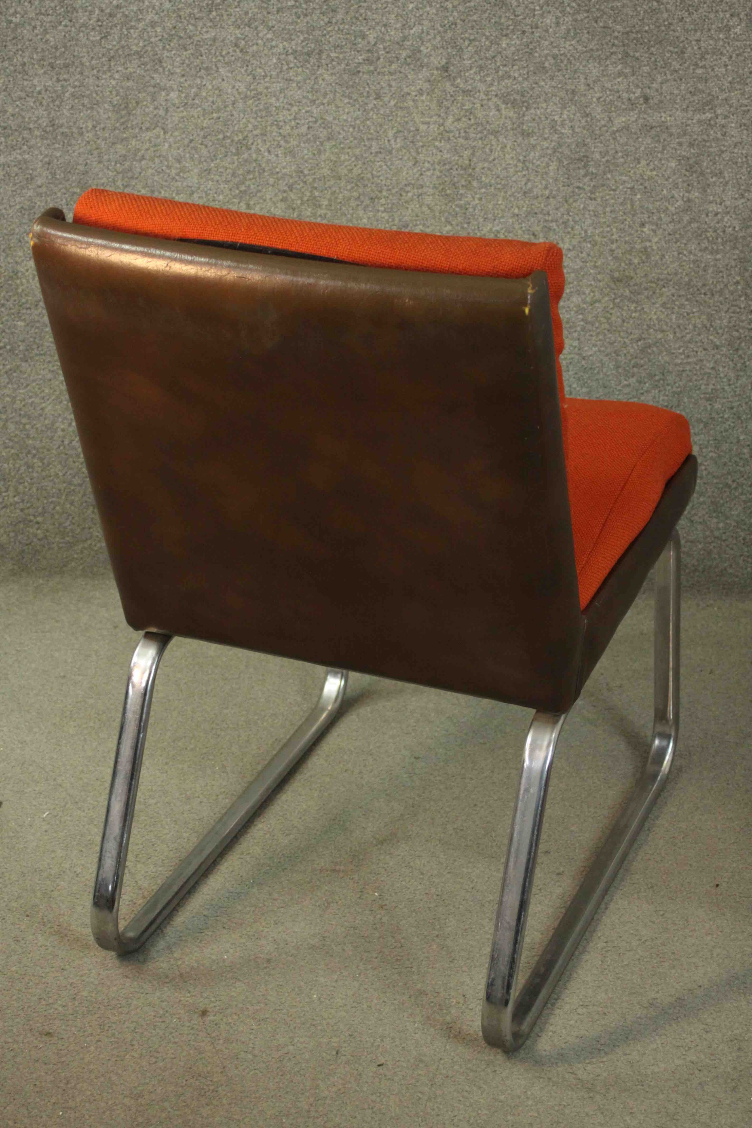 Gordon Russell for Verco, an office chair, upholstered in red fabric, with a leather frame, on - Image 4 of 6