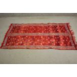 A handmade red ground Persian Kelim rug. L.160 W.104cm.