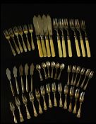 A collection of silver plate cutlery, including fish sets, tea spoons an fruit forks, various