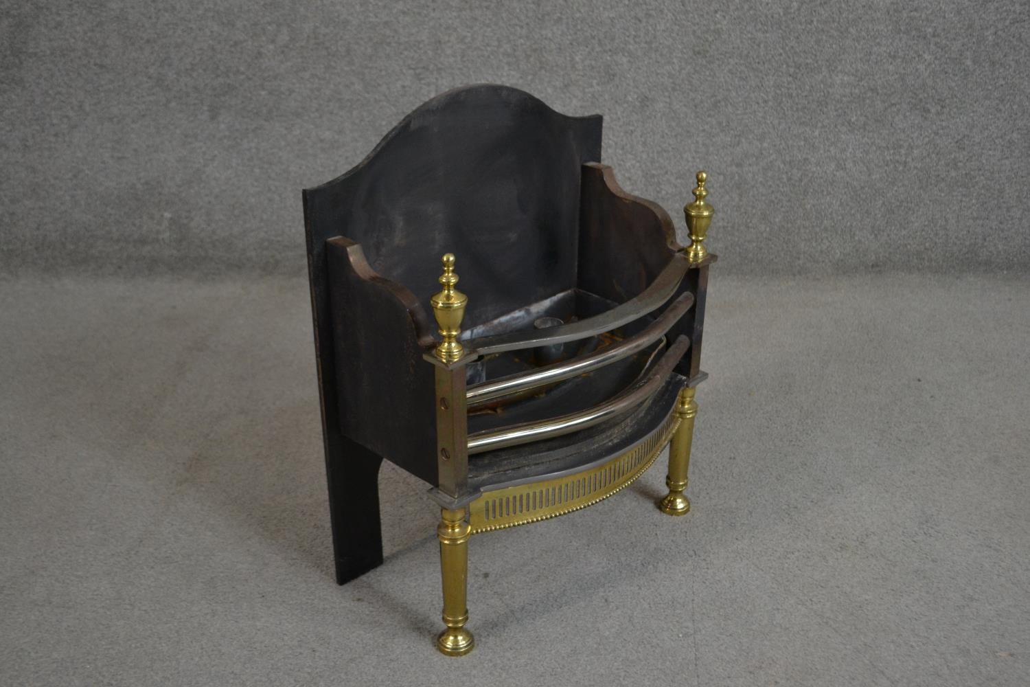 A Victorian cast iron and brass fire basket with pierced design. H.59 W.47 D.27cm - Image 5 of 5