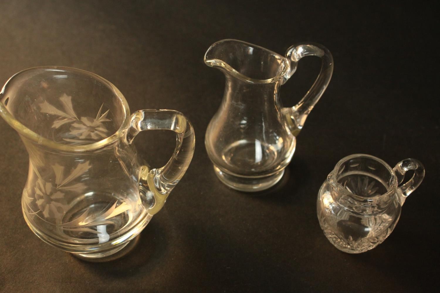 A collection of cut crystal and glass, including a large cut crystal lidded jar, various size jugs - Image 5 of 14