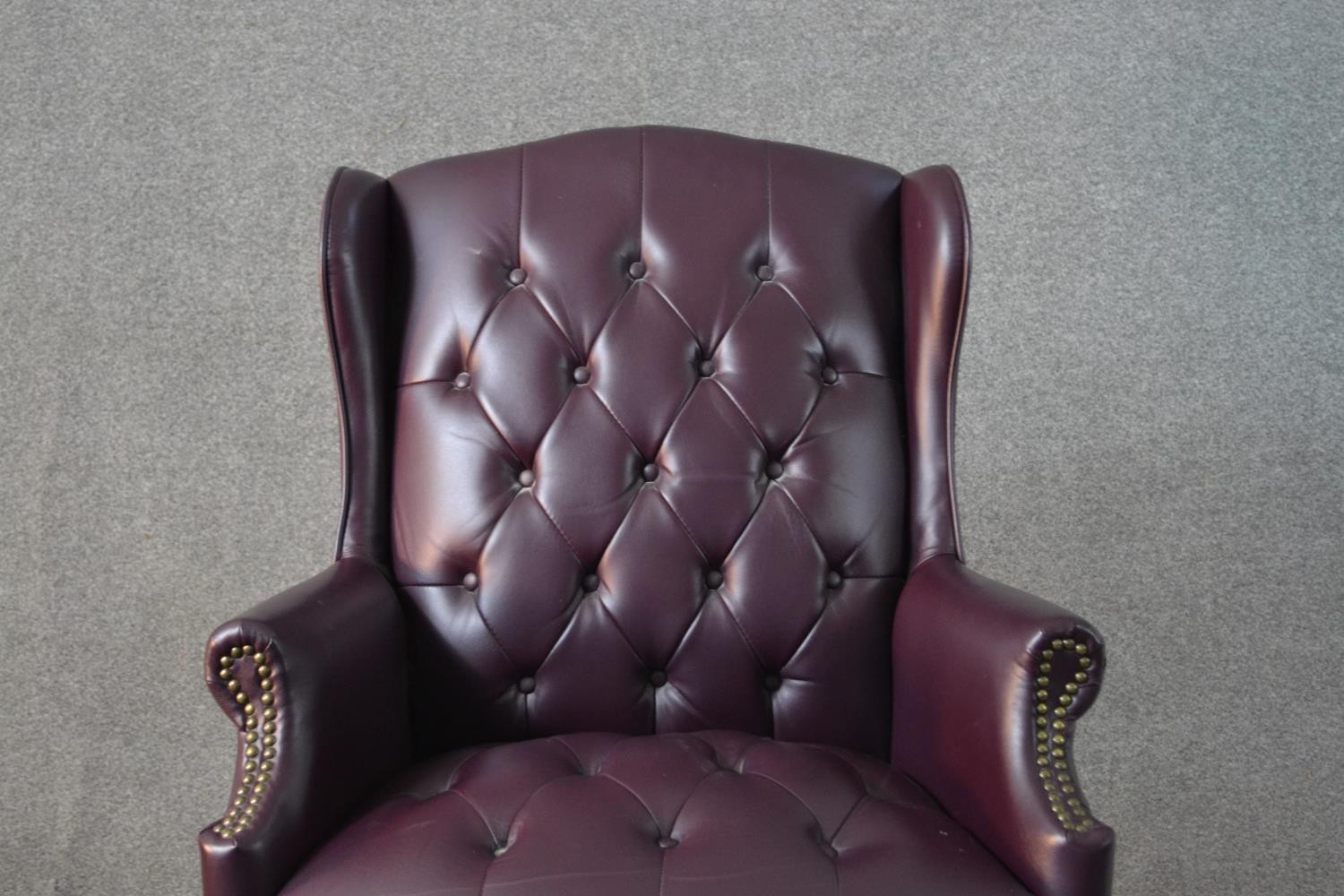A 20th century wing back swivel office chair, upholstered in burgundy leather, with buttoned back - Image 8 of 13
