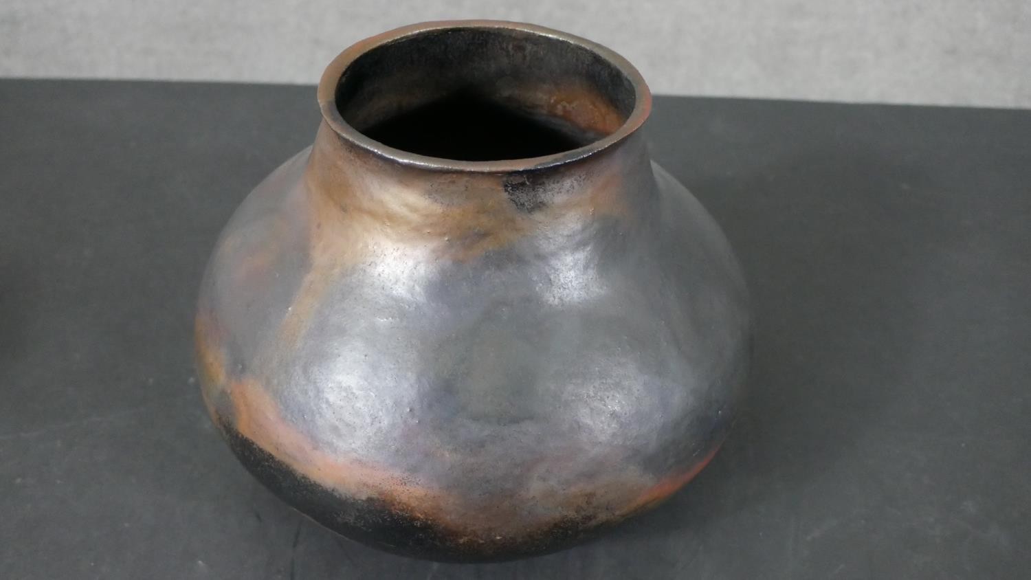 A collection of art pottery, including a gold crackle raku tea pot, a bronze glaze vase on three - Image 4 of 11