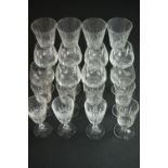 A collection of twenty alcohol glasses, including a set of six hand cut crystal brandy glasses, a