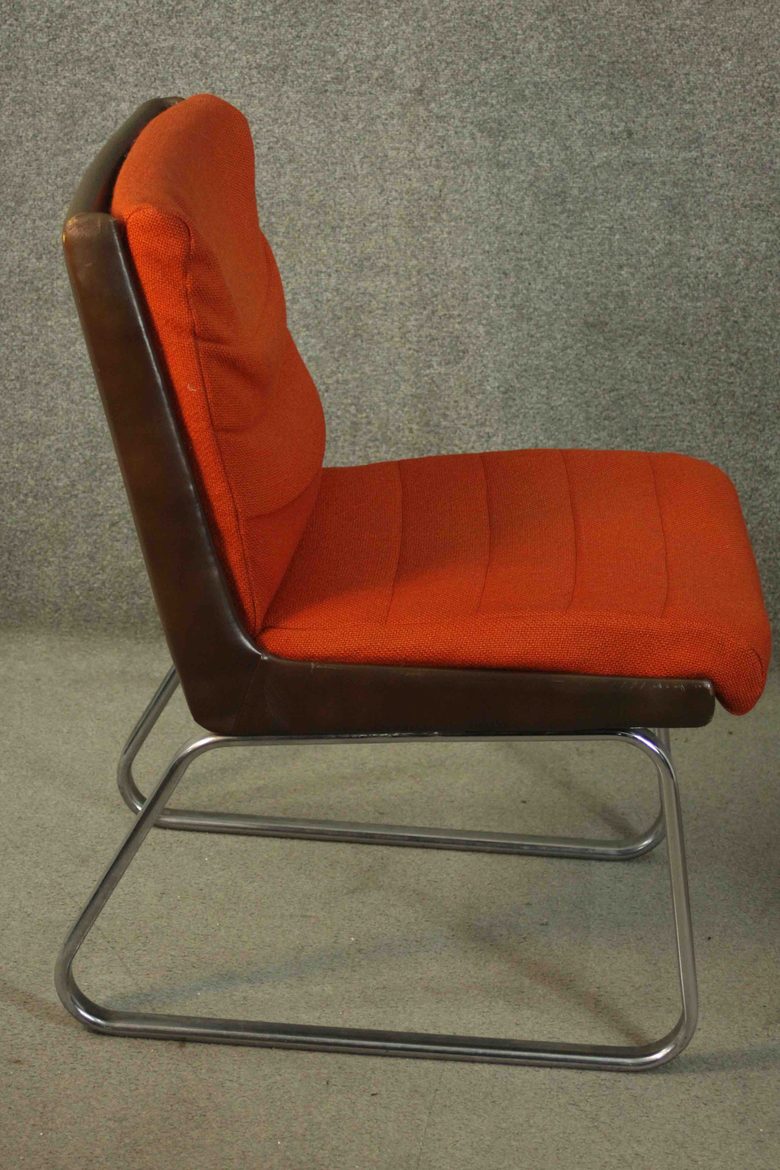 Gordon Russell for Verco, an office chair, upholstered in red fabric, with a leather frame, on - Image 3 of 6