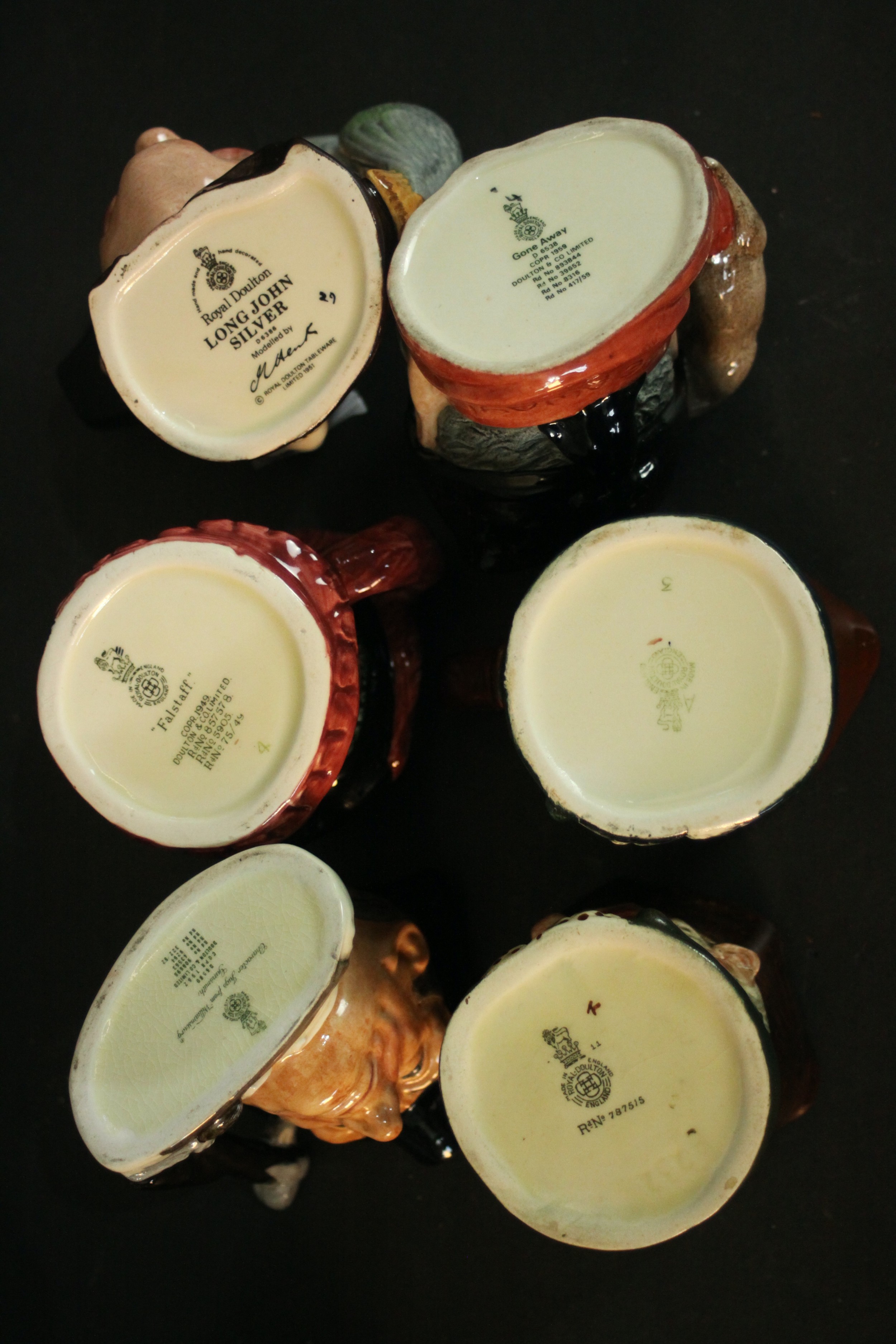 A collection of nine hand-painted Toby jugs, makers marks to the bases. H.16 W.14cm. (largest) - Image 9 of 9