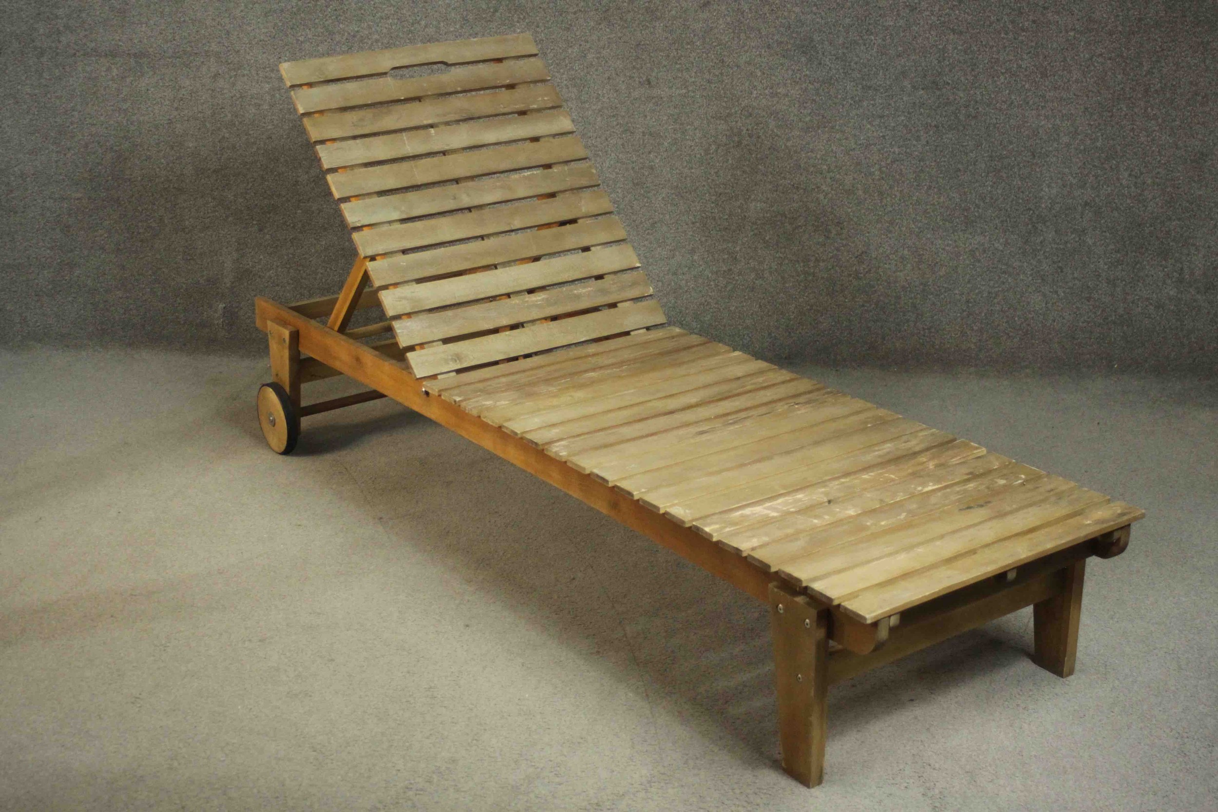 A pair of contemporary teak garden sun loungers of slatted form with adjustable back, on wheels. H. - Image 4 of 9