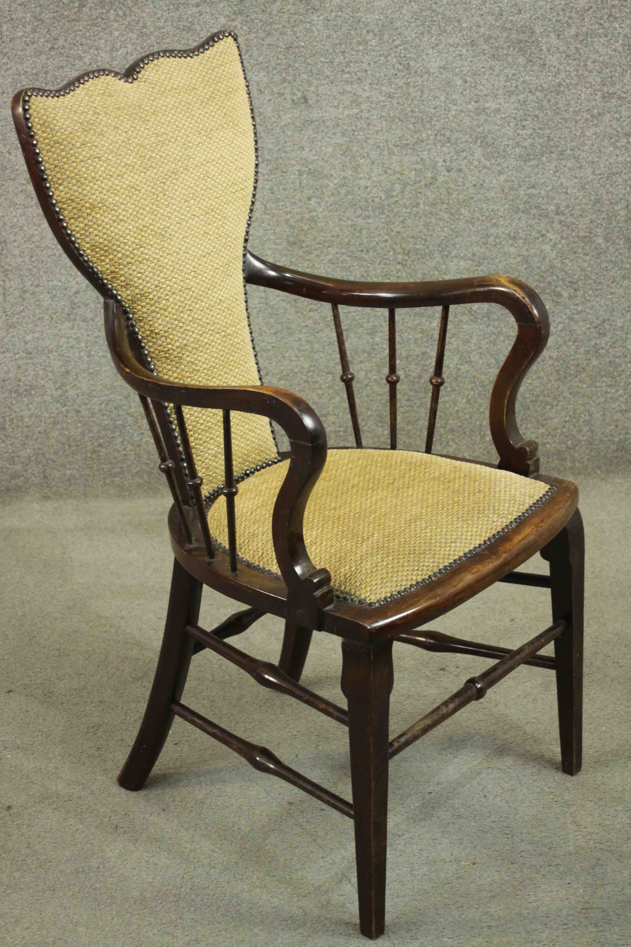A circa 1900 open armchair, with a shaped back, and spindles to the curved arms, with yellow - Image 2 of 5