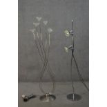 Two contemporary floor standing lamps, one chromed with two adjustable spotlights, the other with