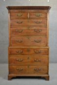 A George III mahogany chest on chest with a dentil cornice above two short and six long graduated