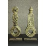 Two carved and painted architectural finials on stands. H.54 W.20 D.10cm.