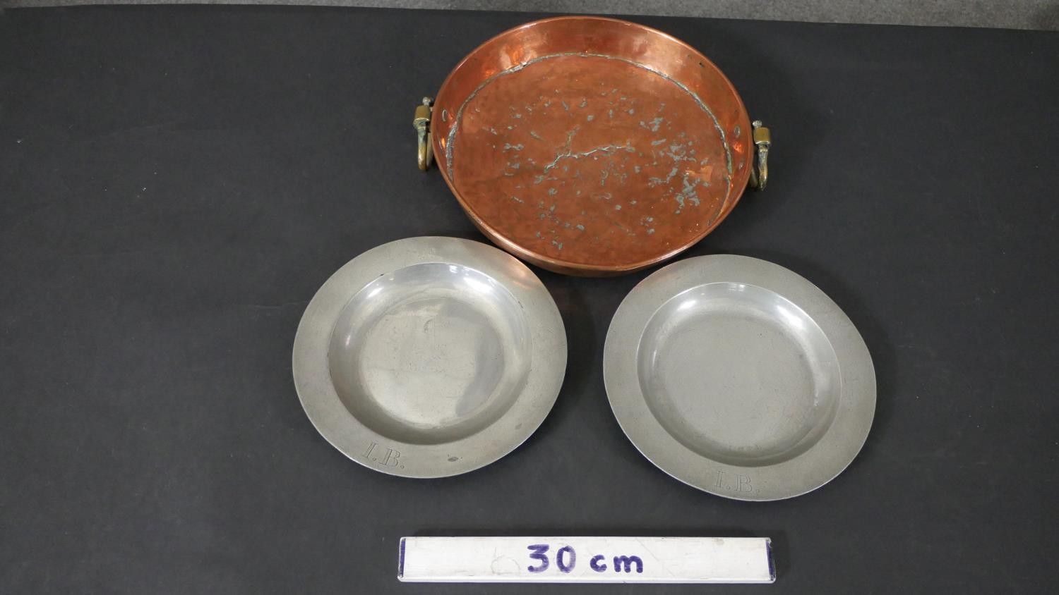 Two 18th century pewter plates with impressed makers mark along with a twin handled Victorian copper - Image 2 of 10