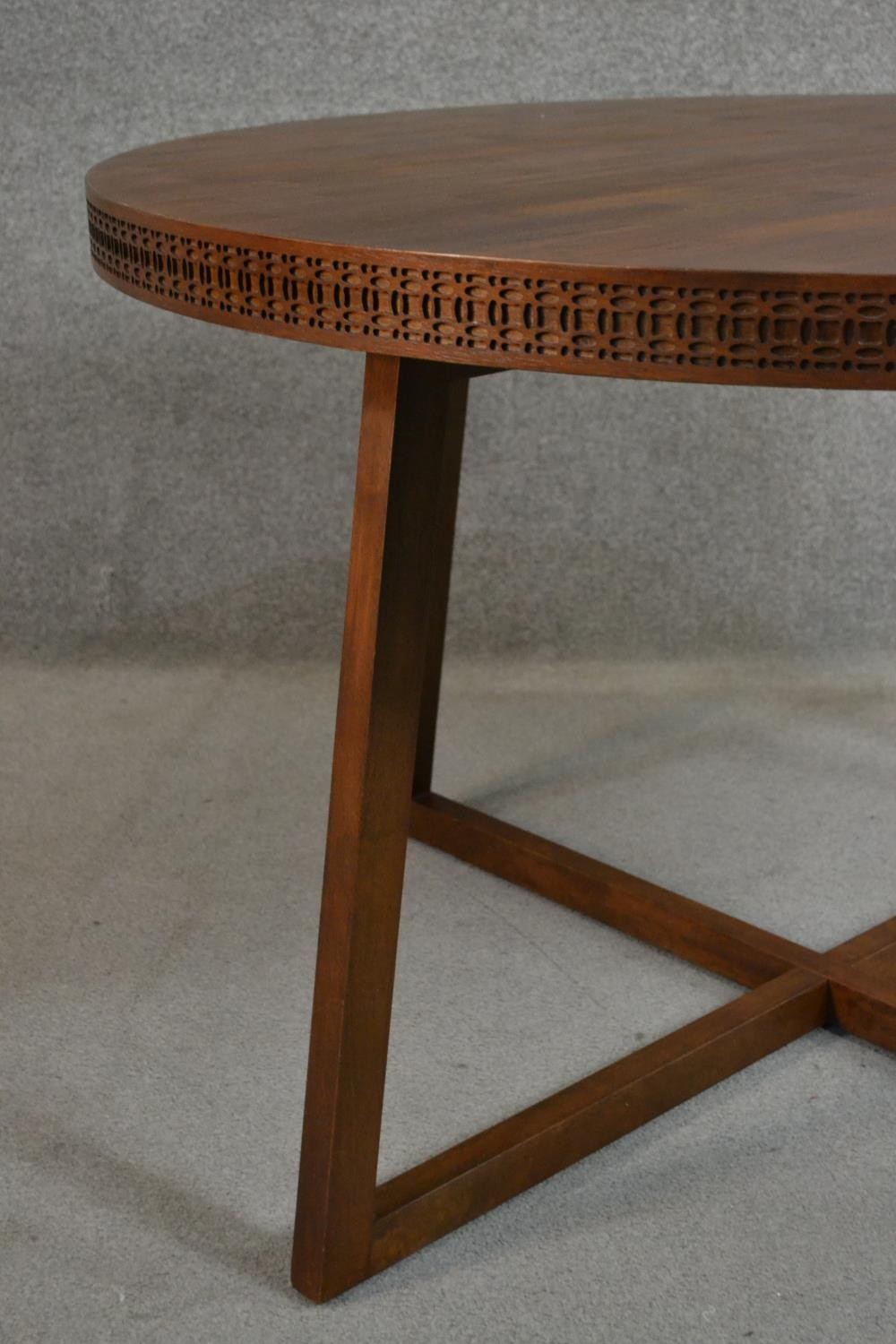 A contemporary circular hardwood dining table, the parquetry top with a blind fret edge on splayed - Image 4 of 6