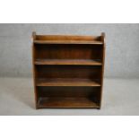 An early to mid-20th century open bookcase with four shelves. H.90 W.76 D.20cm