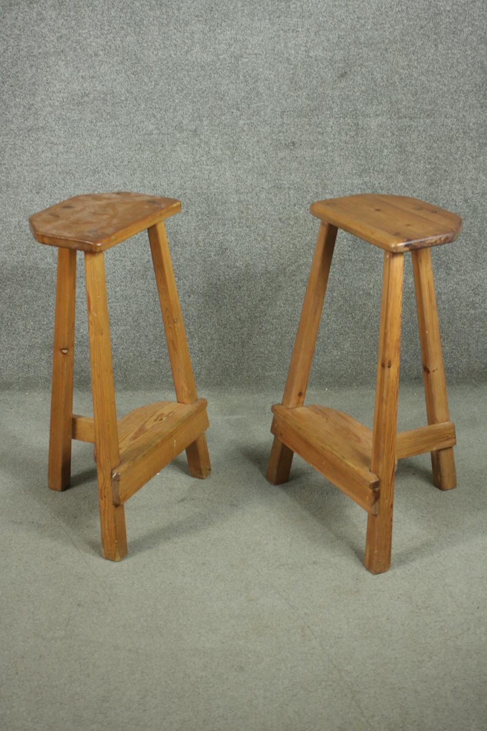 A pair of 20th century pine bar stools, the seat with two canted corners, on splayed square - Image 3 of 6