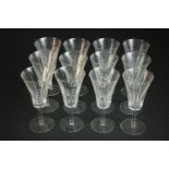 A set of twelve hand cut crystal wine glasses with trumpet shape. H.17 Dia. 8cm.