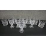 A collection of eleven hand cut crystal drinking glasses including a set of six hand cut crystal