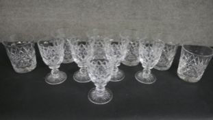 A collection of eleven hand cut crystal drinking glasses including a set of six hand cut crystal