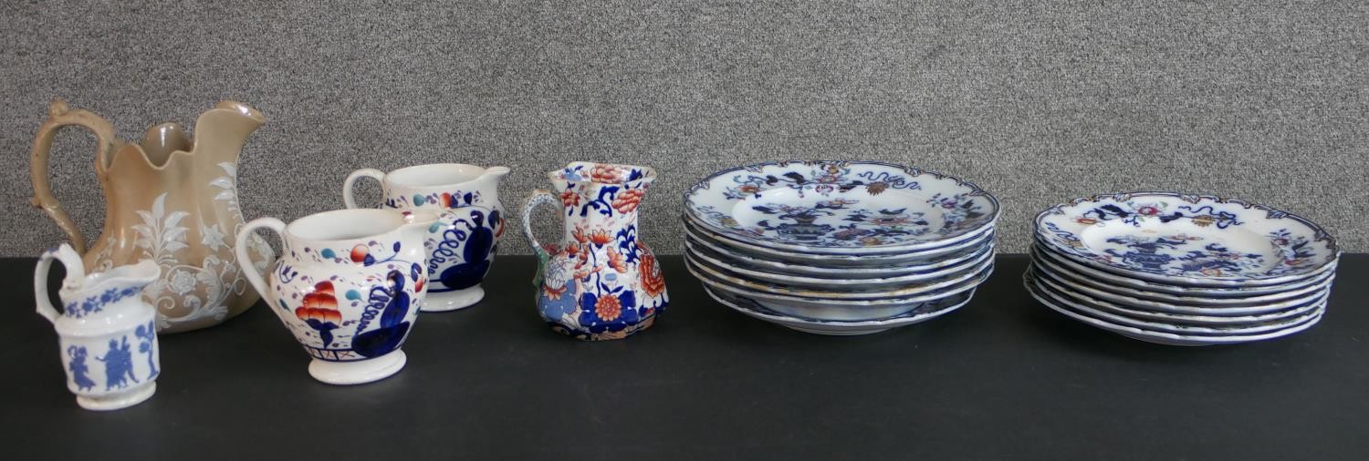 A collection of 19th century hand-painted ceramics, including a Masons jug, two Georgian Welsh cream
