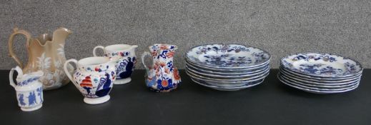 A collection of 19th century hand-painted ceramics, including a Masons jug, two Georgian Welsh cream