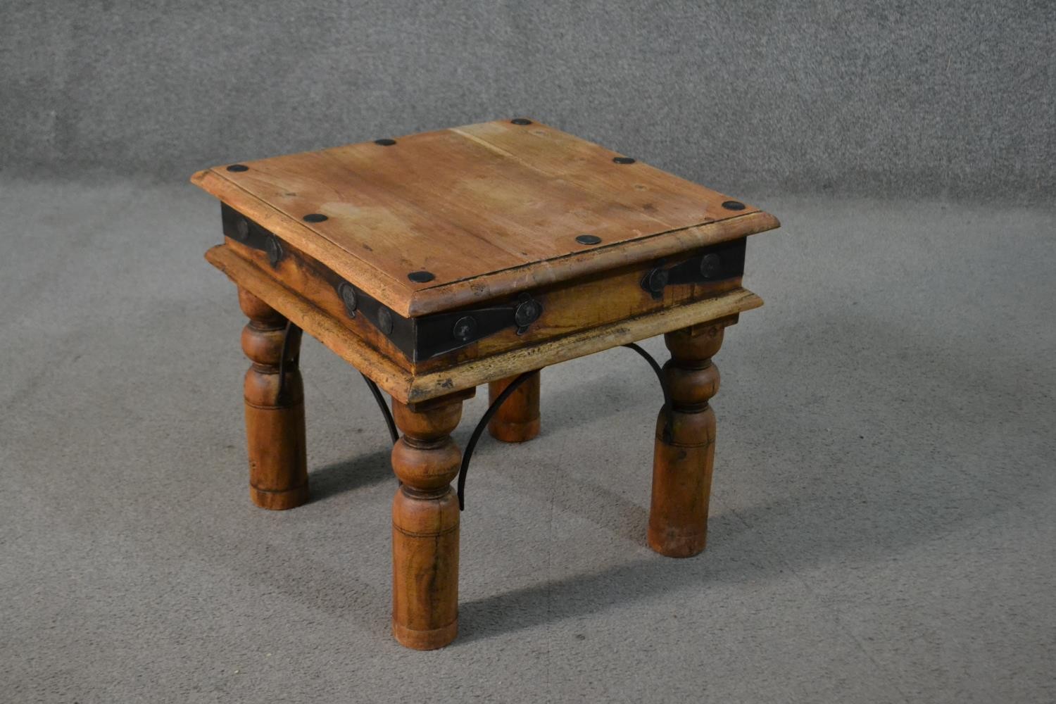 An Indian Sheesham occasional coffee table, the square top with iron studs, on turned legs with iron - Image 5 of 5