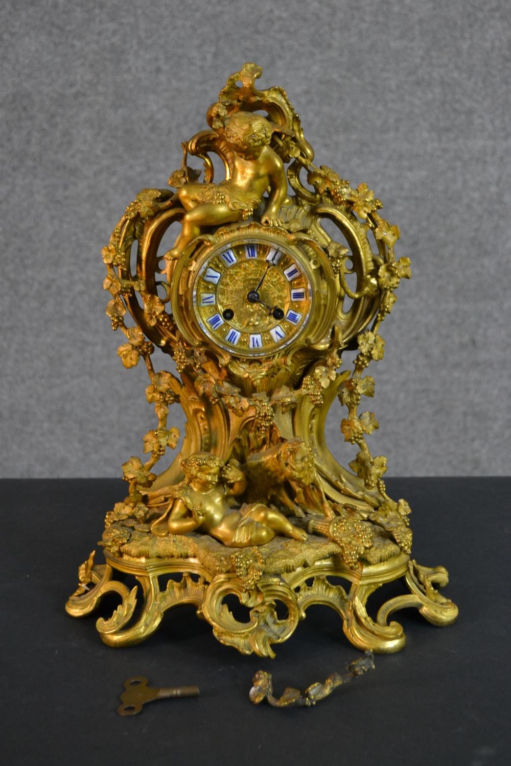 A 19th century French gilt spelter and ormolu mantel clock by Henry Marc of Paris, in Rococo