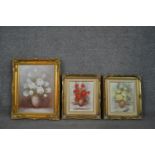 Three framed oils on canvas of vases of flowers, two Kay Gilbert and one Robert Cox. H.50 W.40cm (