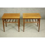 A pair of circa 1960's probably Danish teak occasional tables, of rectangular form with a slatted