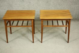 A pair of circa 1960's probably Danish teak occasional tables, of rectangular form with a slatted