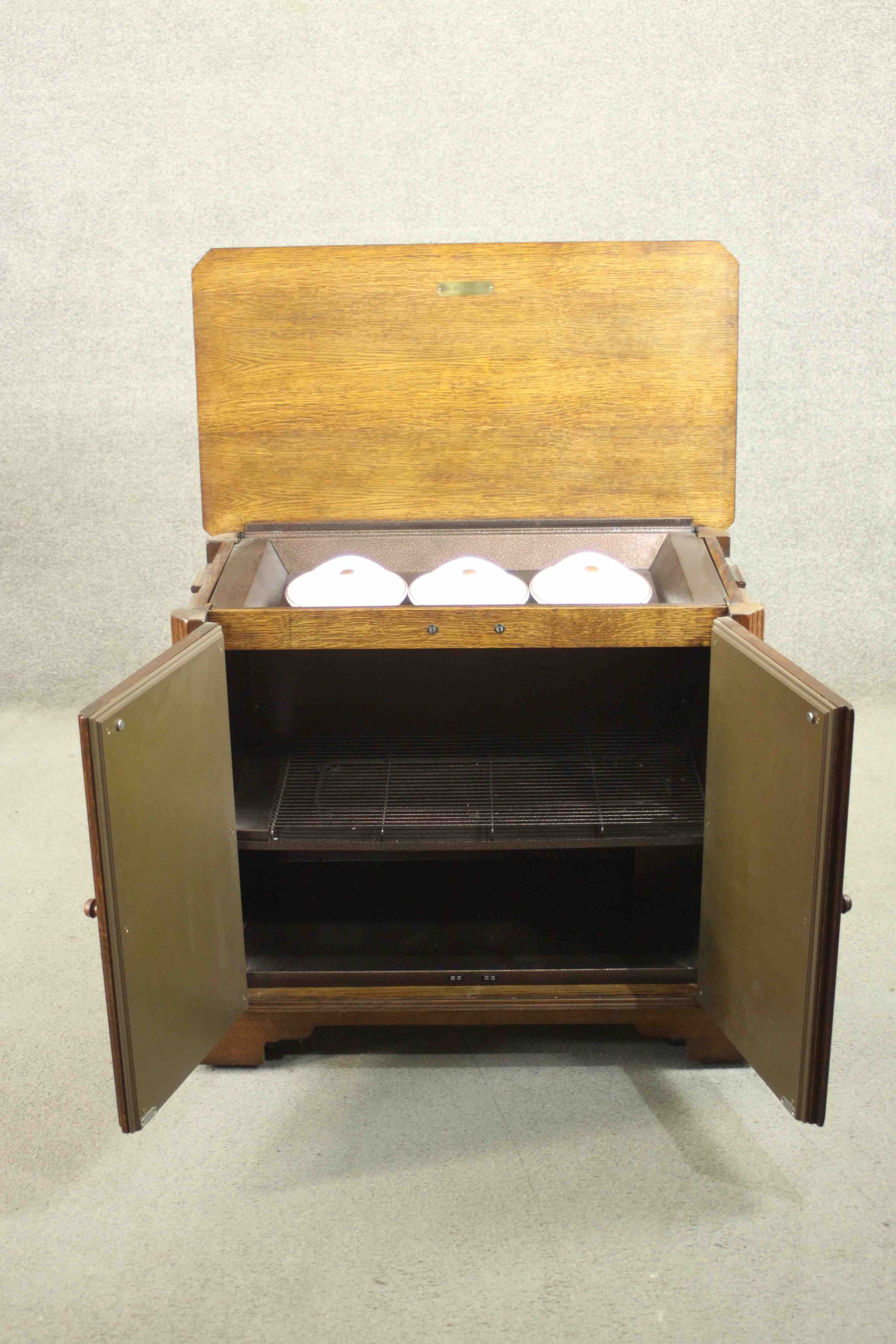 The Burley Butler; an oak heated sideboard electric food warmer, with a rising lid and two - Image 5 of 11