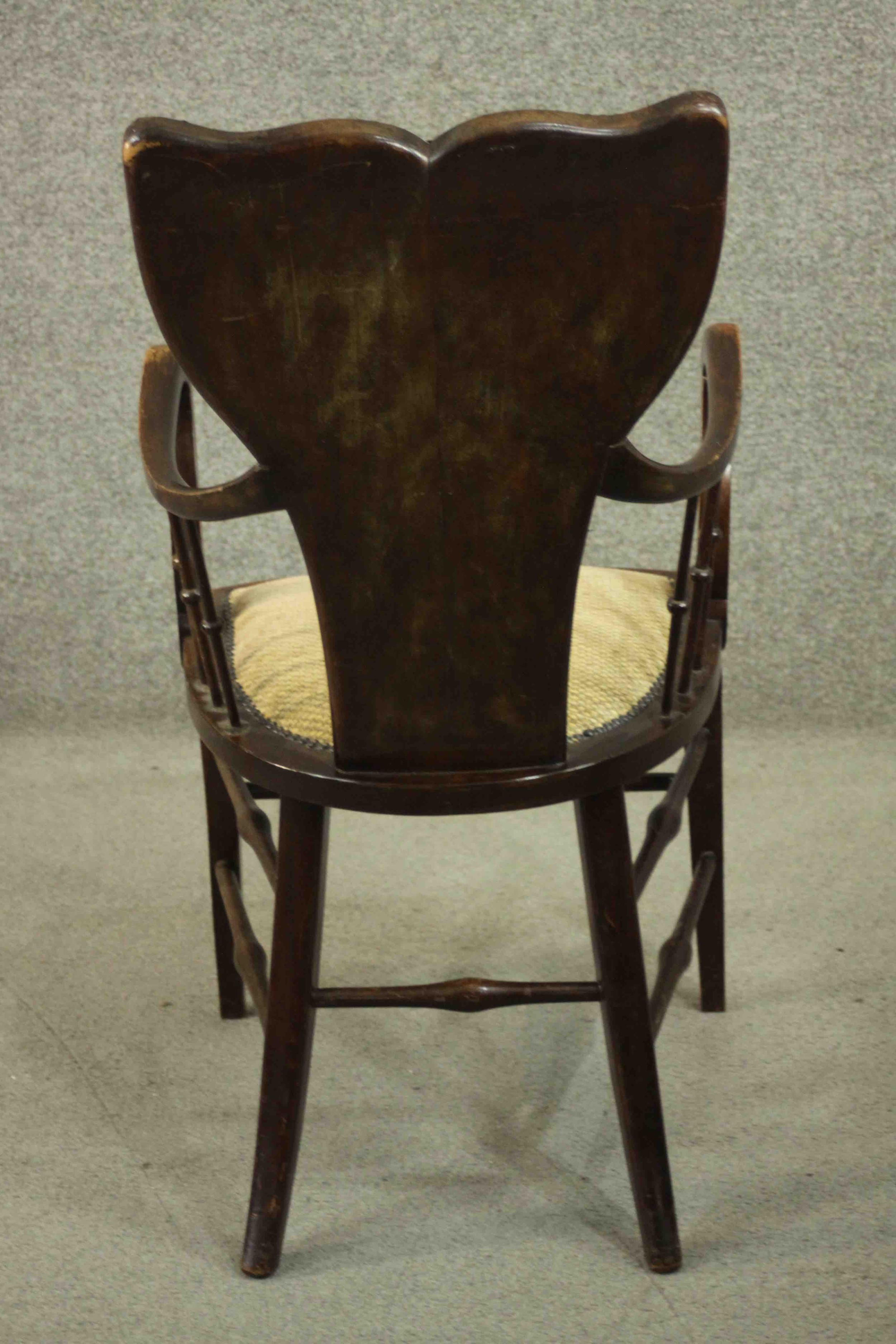 A circa 1900 open armchair, with a shaped back, and spindles to the curved arms, with yellow - Image 5 of 5