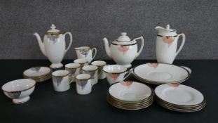 Two Art Deco Royal Doulton hand-painted Tango pattern coffee sets, 29 pieces.