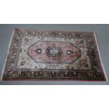 A handmade cream ground Persian silk Kum rug. L.160 W.102cm