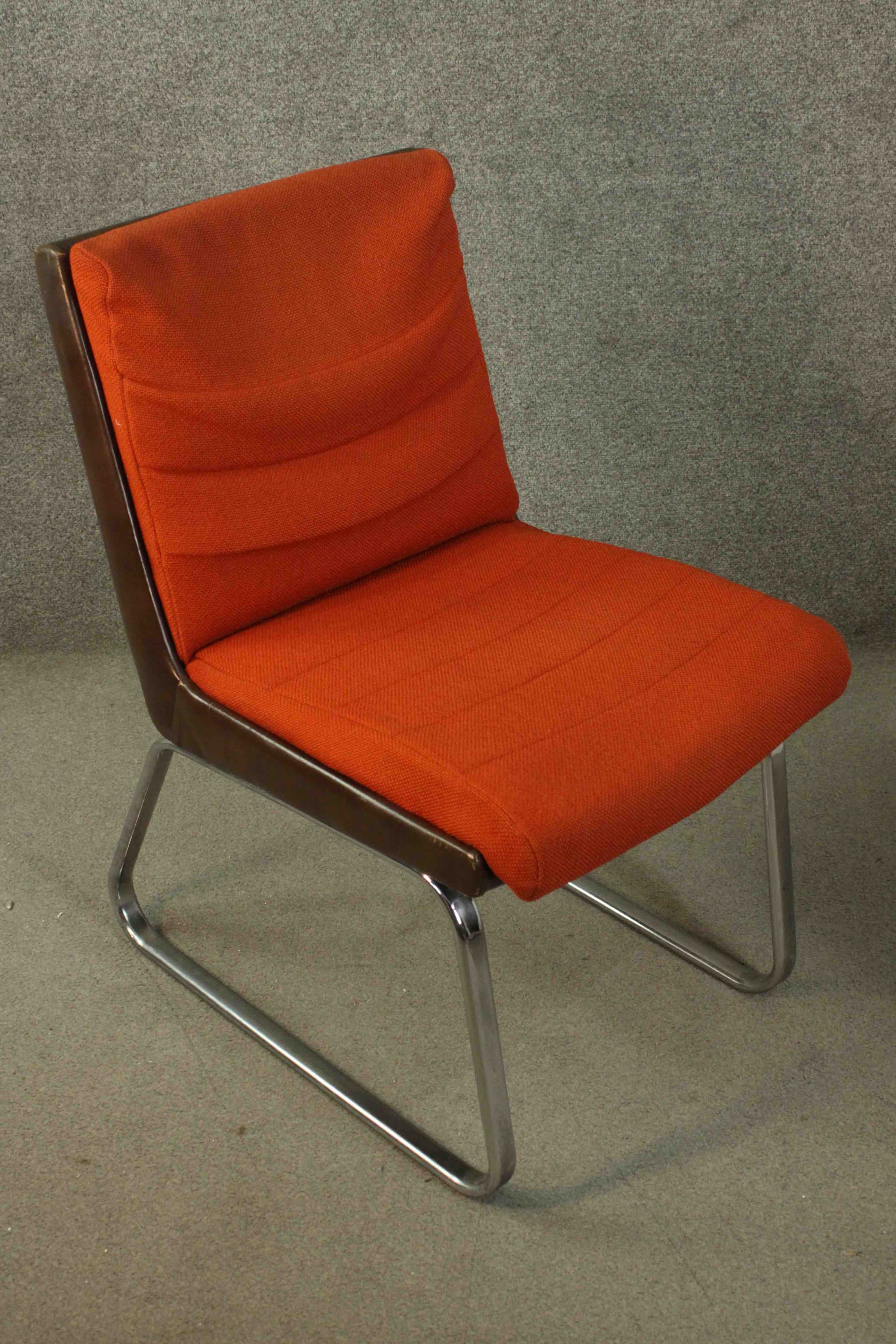 Gordon Russell for Verco, an office chair, upholstered in red fabric, with a leather frame, on - Image 2 of 6