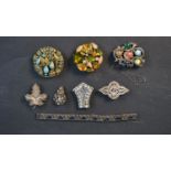 A collection of jewellery including a silver filigree work maple leaf brooch and a French Art Deco