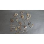 A large collection of approximately fifty antique keys.
