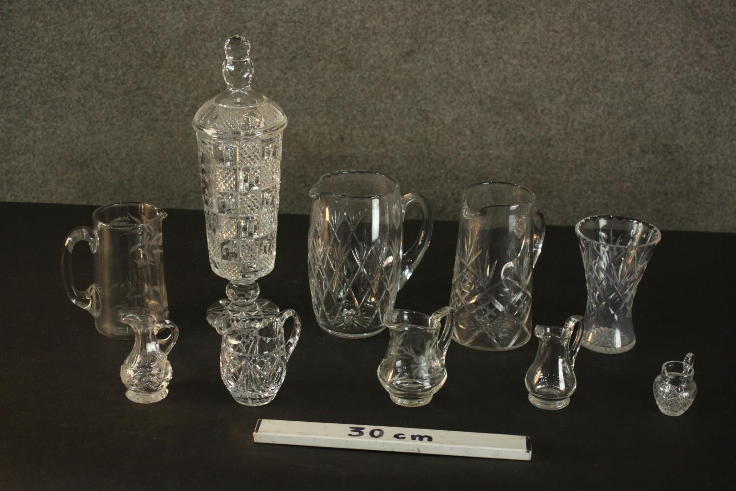 A collection of cut crystal and glass, including a large cut crystal lidded jar, various size jugs - Image 2 of 14