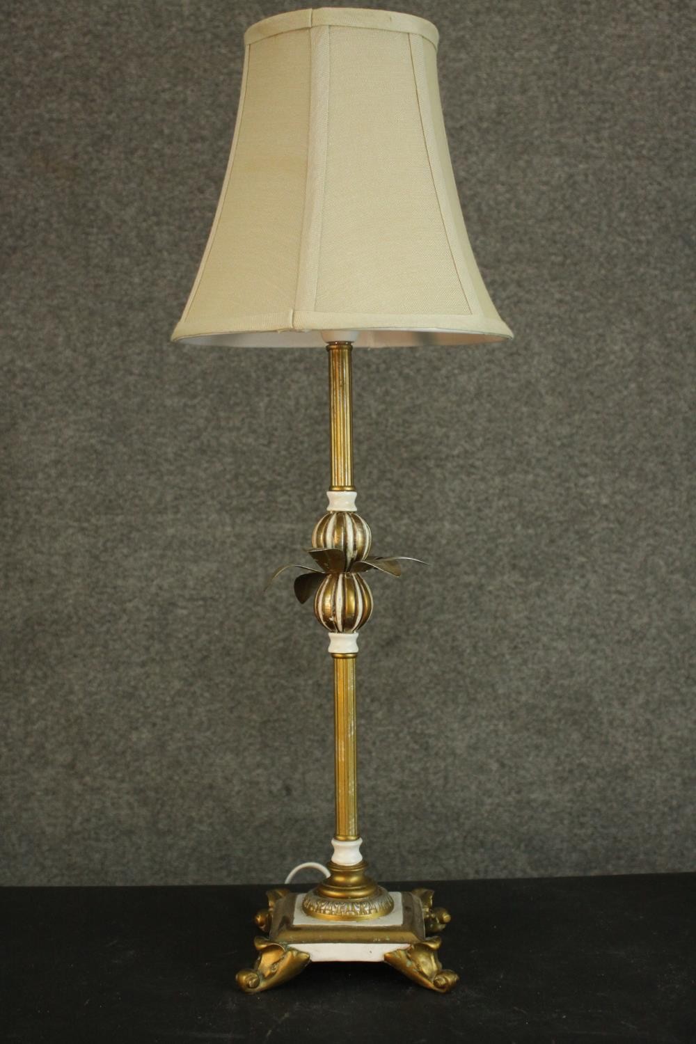 A pair of parcel gilt and white painted table lamps, with leaf detail, on four acanthus leaf feet, - Image 3 of 6