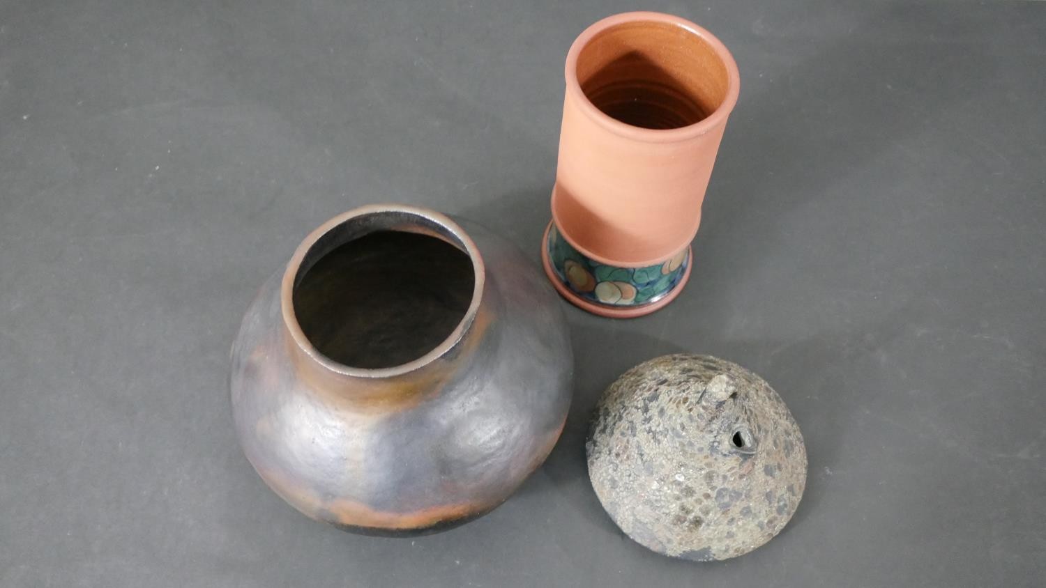 A collection of art pottery, including a gold crackle raku tea pot, a bronze glaze vase on three - Image 3 of 11