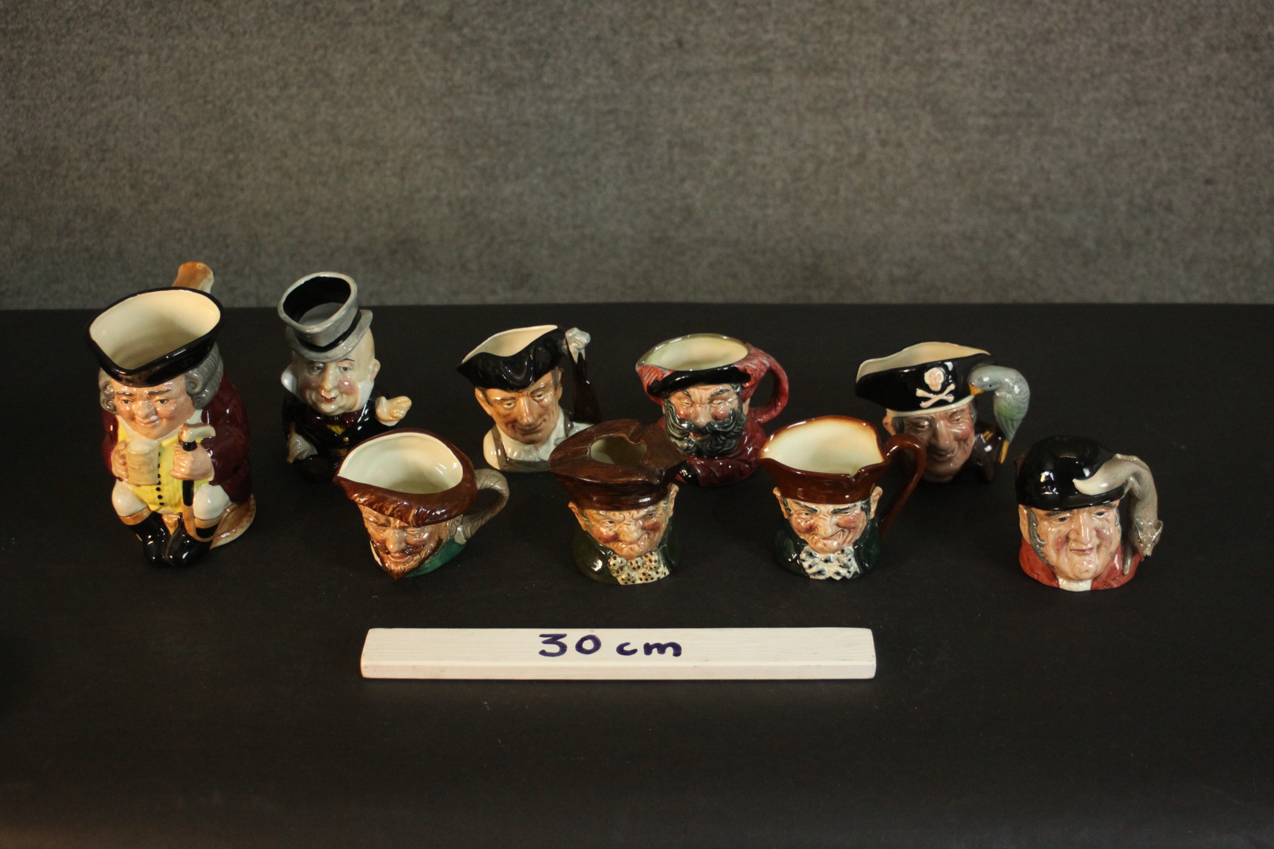A collection of nine hand-painted Toby jugs, makers marks to the bases. H.16 W.14cm. (largest) - Image 2 of 9