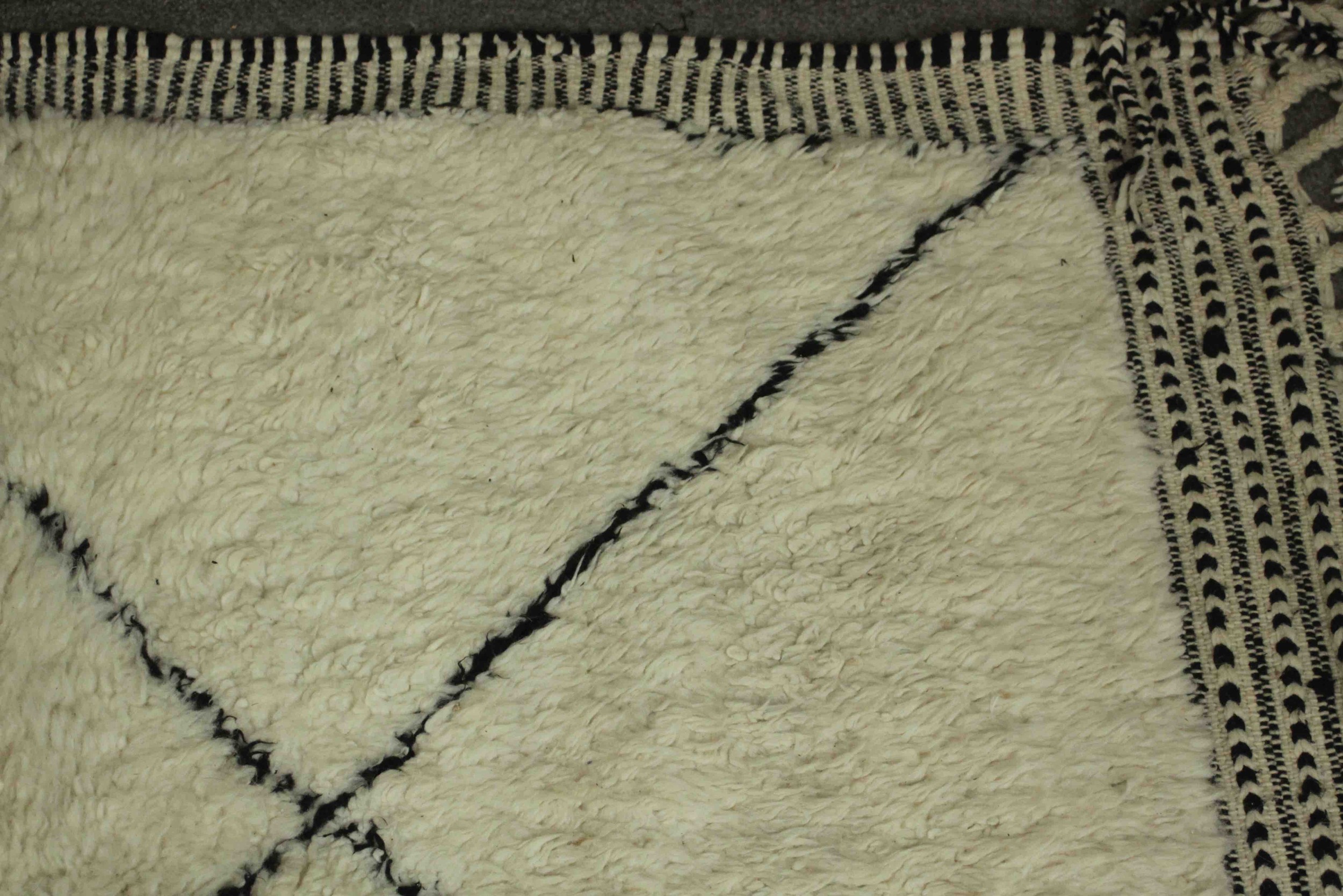 A handmade cream ground Moroccan carpet with contemporary motif. L.314 W.208cm. - Image 4 of 5