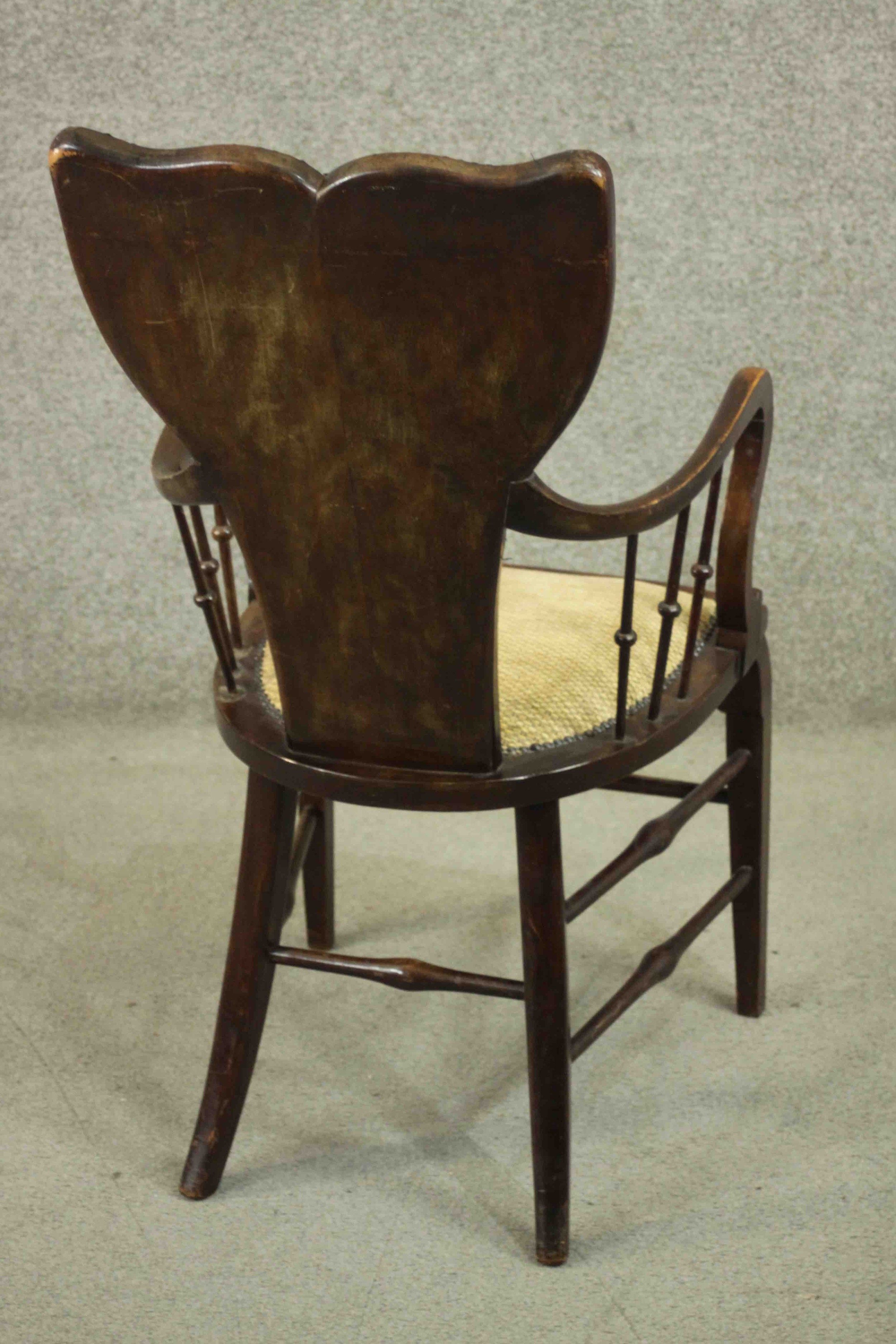 A circa 1900 open armchair, with a shaped back, and spindles to the curved arms, with yellow - Image 4 of 5