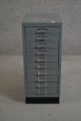 A mid to late 20th century painted steel tool/filing chest of ten drawers on a plinth base. H.67 W.