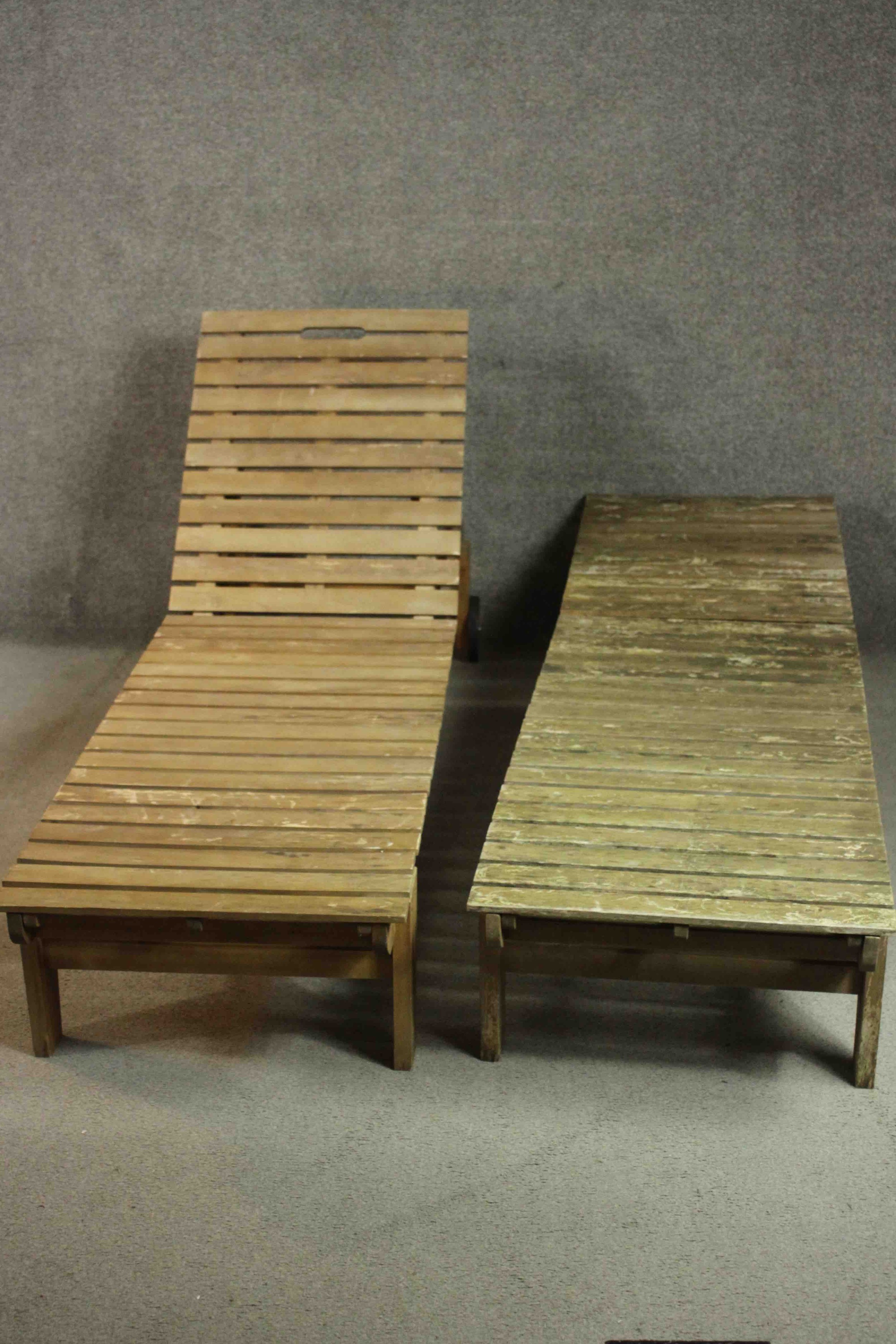 A pair of contemporary teak garden sun loungers of slatted form with adjustable back, on wheels. H. - Image 3 of 9