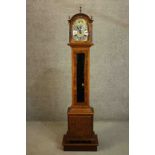 A 20th century 'Warmink' (Dutch) Grandmother long case clock, veneered in burr walnut. The brass and