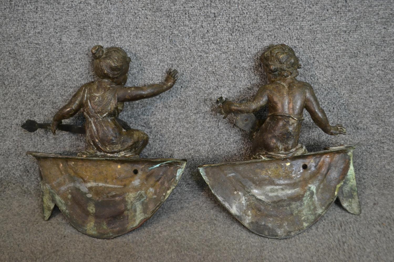 A pair of 19th century bronze finials in the form of putti musicians on swags. H.32 W.27cm - Image 5 of 5