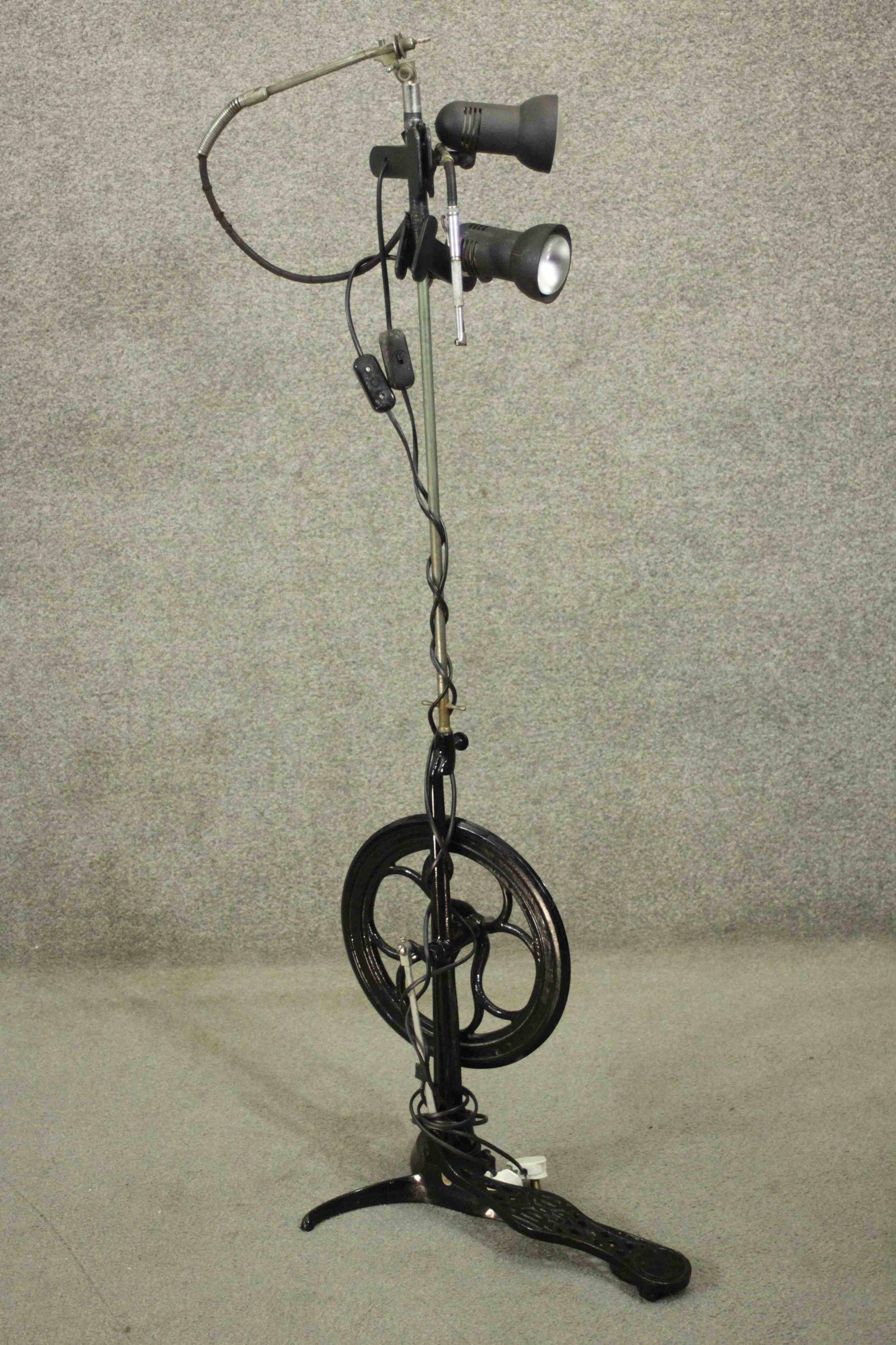 A vintage dentist's drill converted into a standard lamp. H.140 W.130cm.