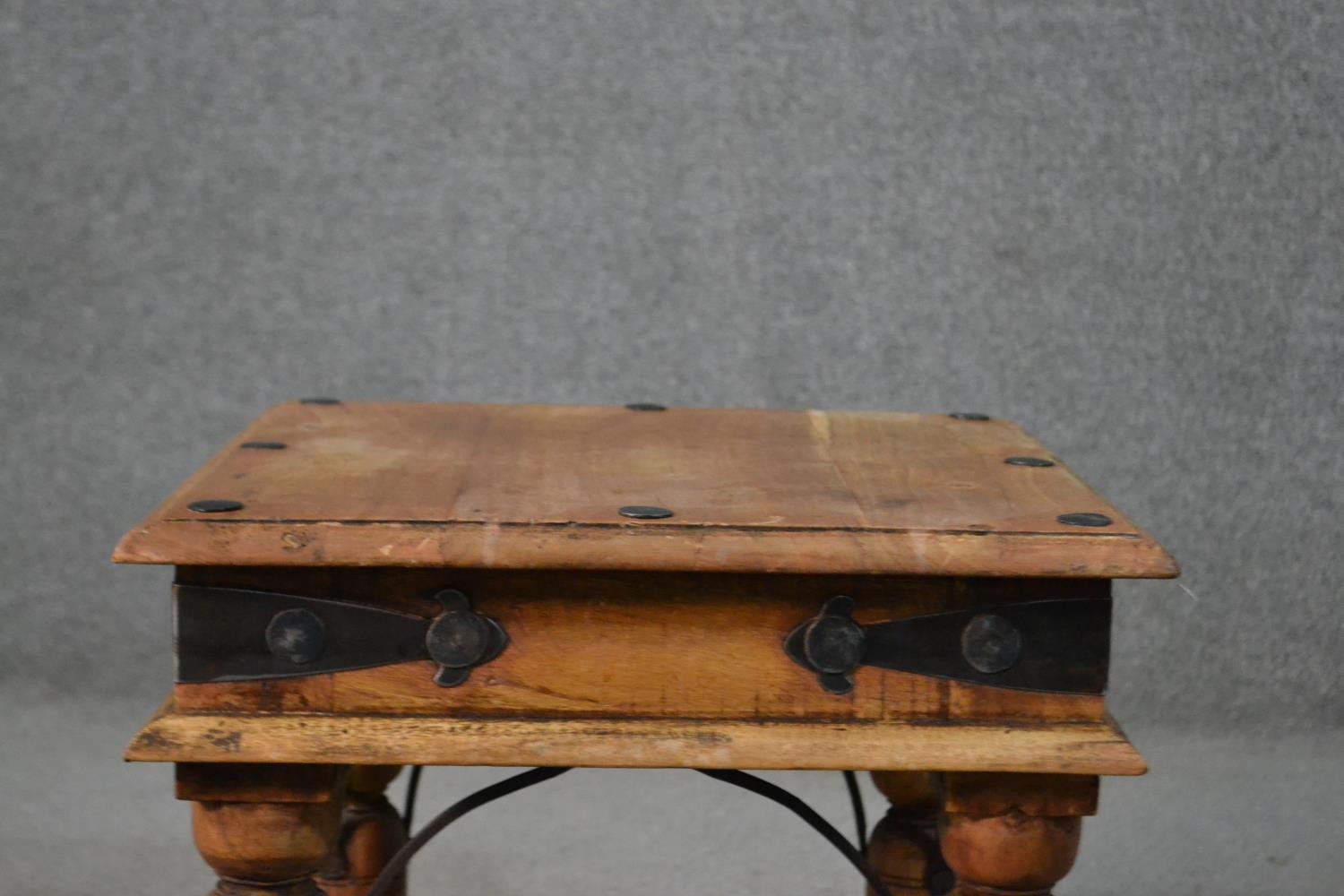 An Indian Sheesham occasional coffee table, the square top with iron studs, on turned legs with iron - Image 2 of 5